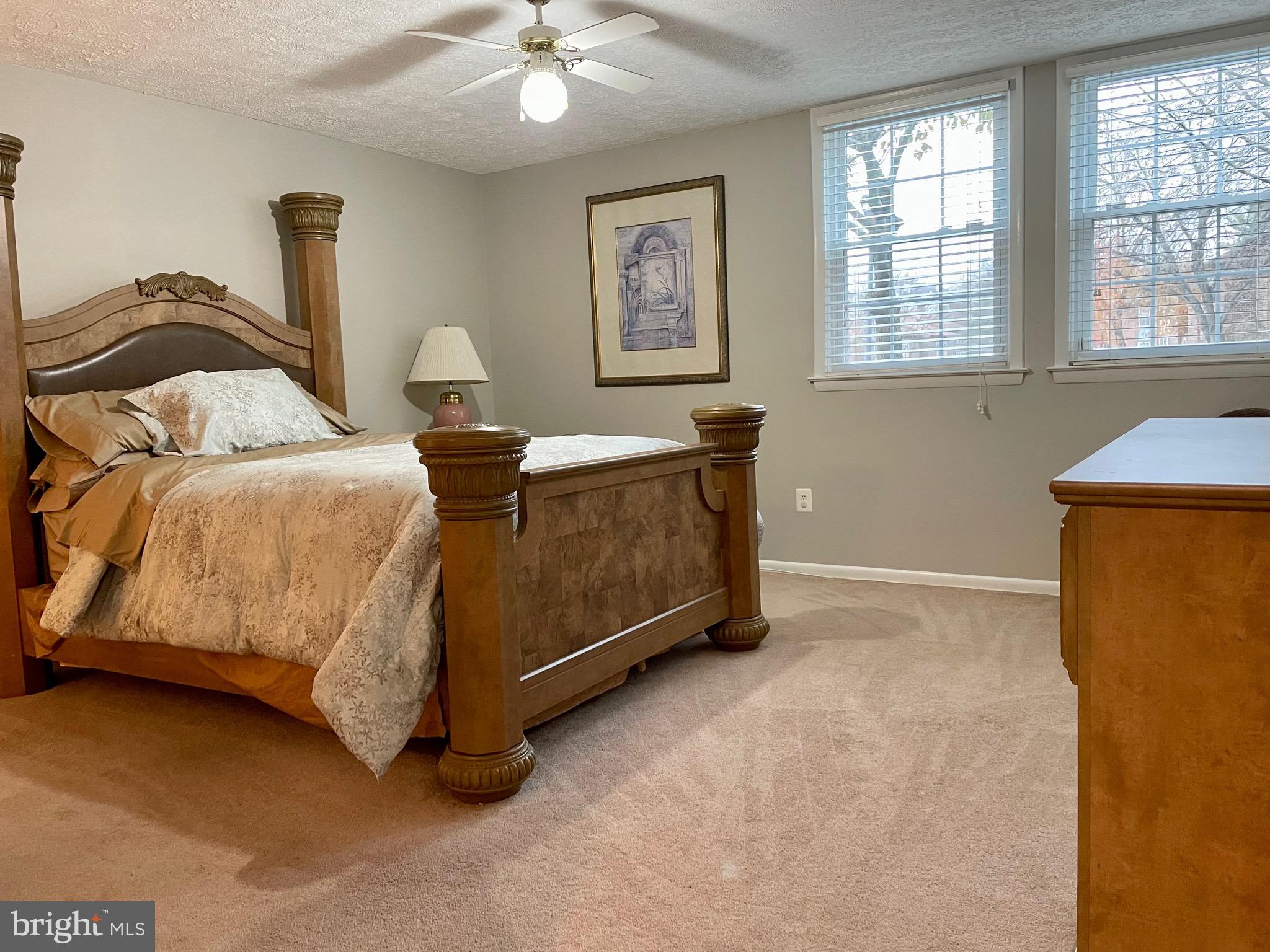 7 A Friendswood Court, Unit 7A Baltimore, MD 21209 - Photo 15 of 32 a spacious bedroom with a bed and window