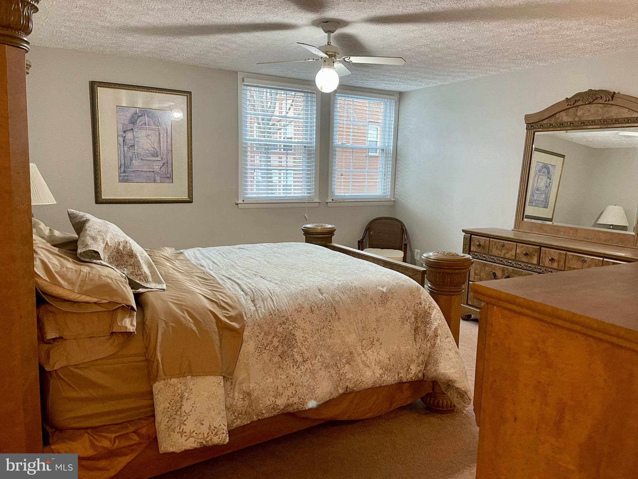 7 A Friendswood Court, Unit 7A Baltimore, MD 21209 - Photo 17 of 32 a bedroom with a bed and window