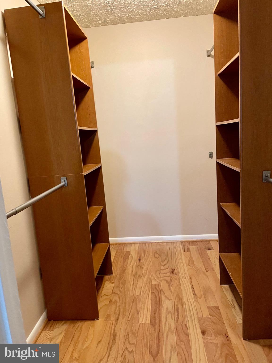 7 A Friendswood Court, Unit 7A Baltimore, MD 21209 - Photo 18 of 32 a view of closet with wooden floor