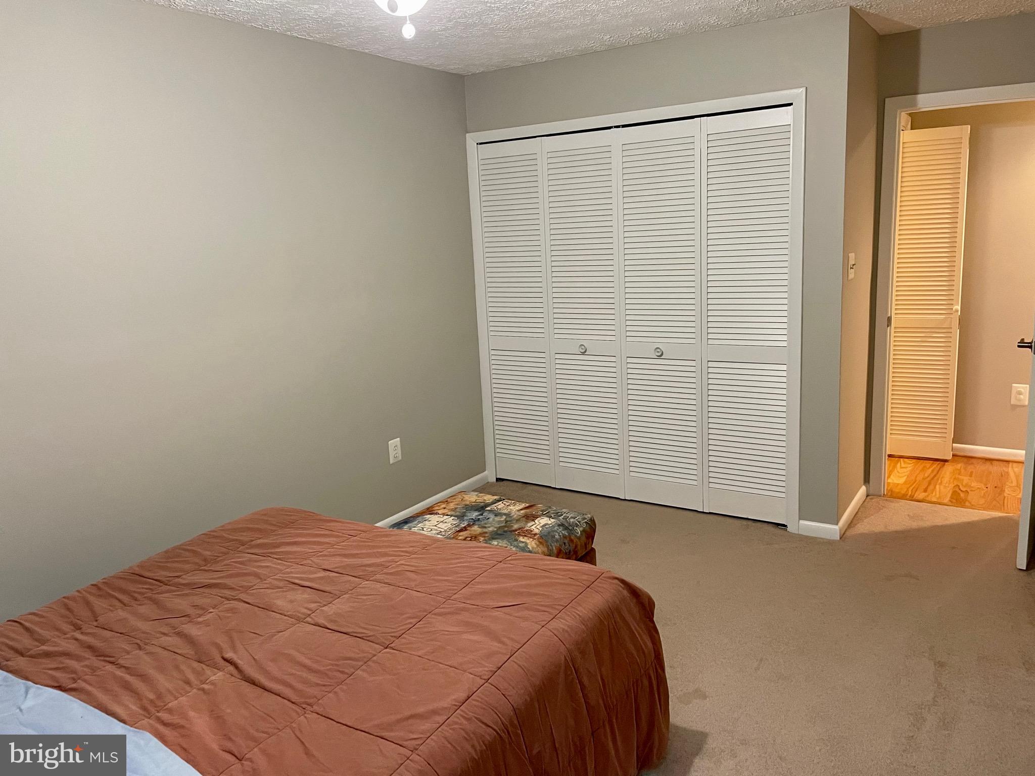 7 A Friendswood Court, Unit 7A Baltimore, MD 21209 - Photo 22 of 32 a bedroom with a bed and a window