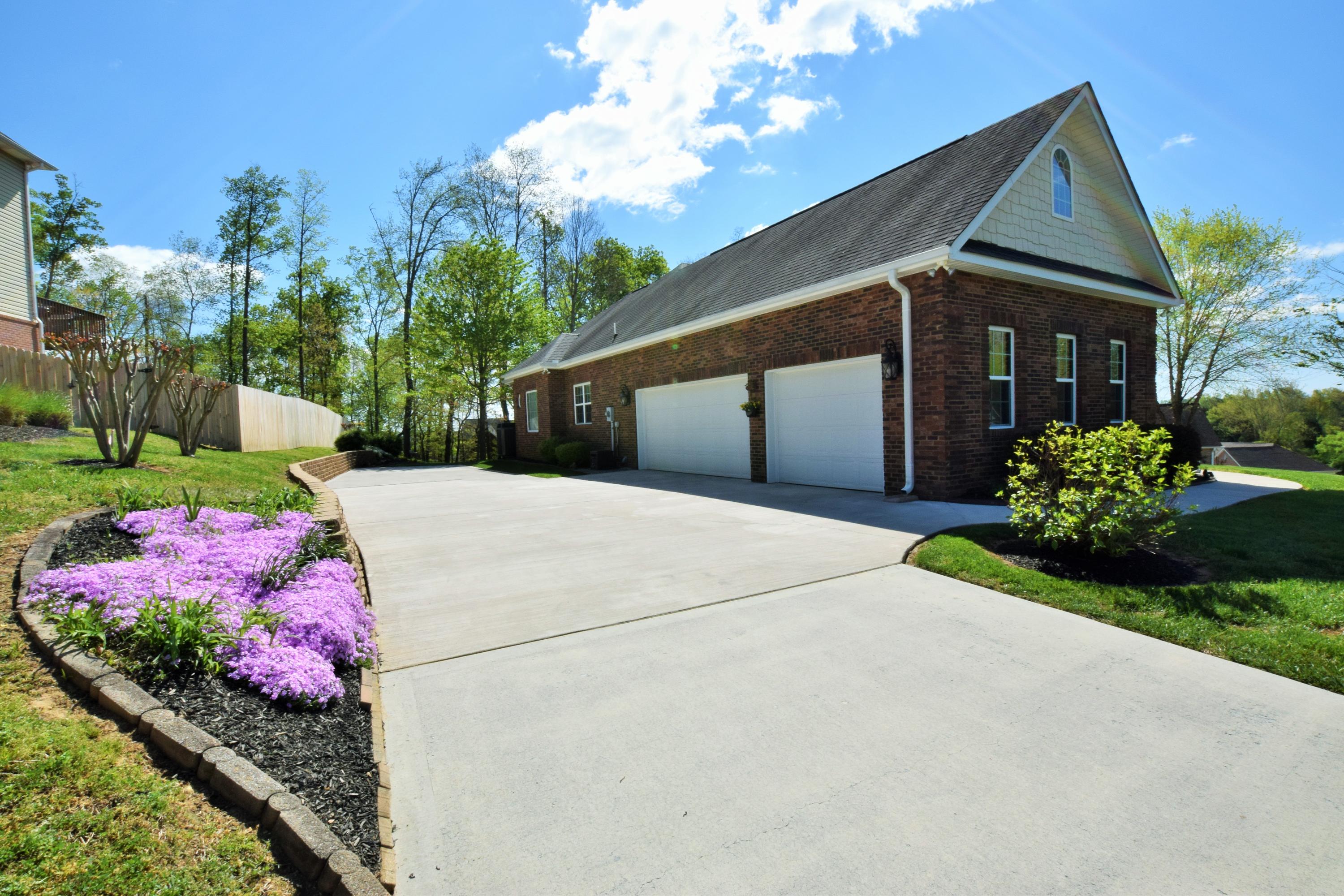 8126 Campbells Point Road Corryton, TN 37721 - Photo 5 of 35 3 car garage side entry