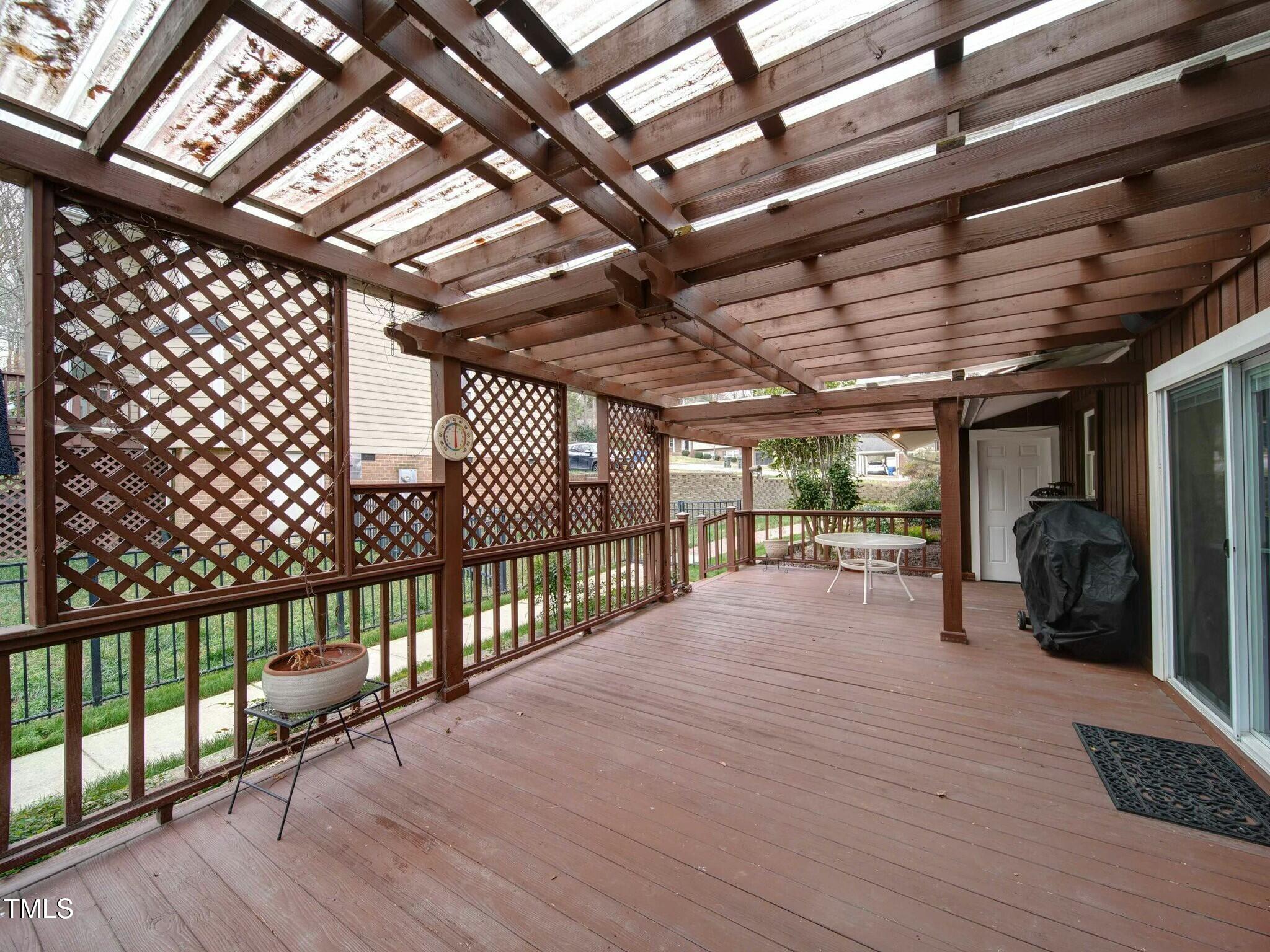 1009 Deboy Street Raleigh, NC 27606 - Photo 7 of 25 main patio with roof