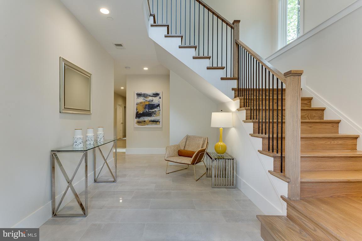 8830 Ridge Road Bethesda, MD 20817 - Photo 4 of 38 Welcoming Foyer w Curved Staircase