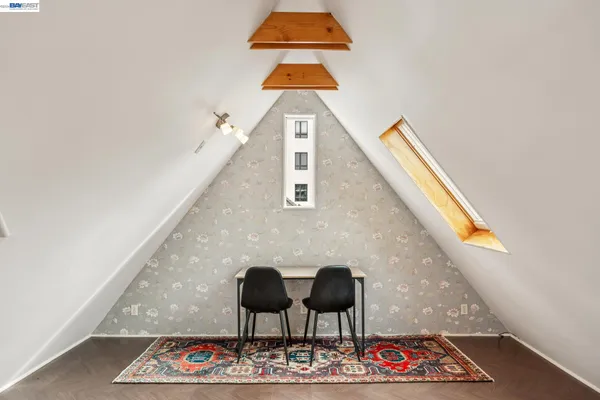 a front view of a house with chairs