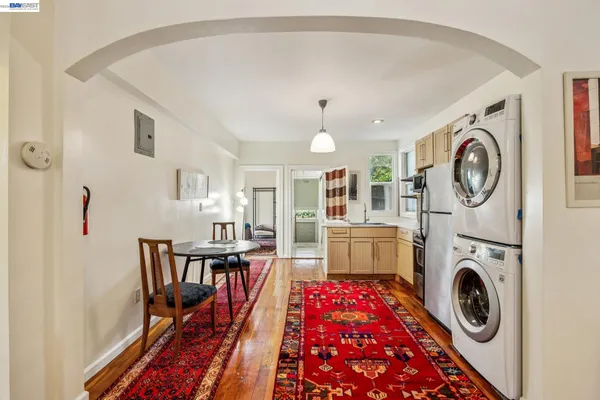 a view of a kitchen with washer and dryer