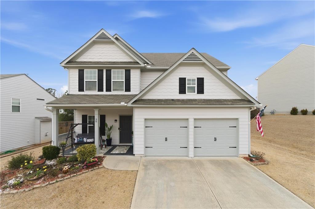 36 Birch River Court Dallas, GA 30132 - Photo 1 of 49 front view of a house with a garage