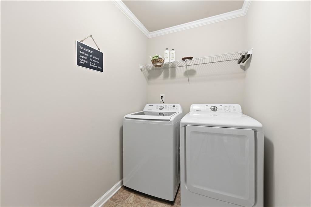 36 Birch River Court Dallas, GA 30132 - Photo 23 of 49 a utility room with dryer and washer