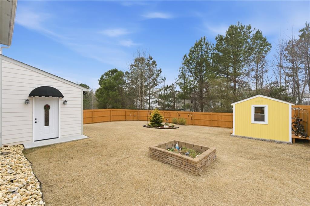 36 Birch River Court Dallas, GA 30132 - Photo 32 of 49 a front view of a house with a yard