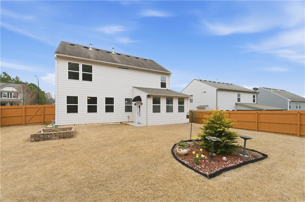 36 Birch River Court Dallas, GA 30132 - Photo 33 of 49 a front view of a house with a yard