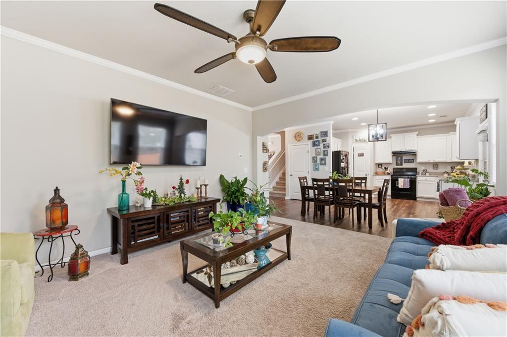 36 Birch River Court Dallas, GA 30132 - Photo 6 of 49 a living room with furniture and a flat screen tv