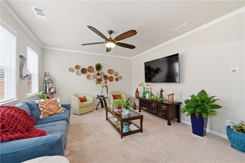 36 Birch River Court Dallas, GA 30132 - Photo 7 of 49 a living room with furniture and a flat screen tv