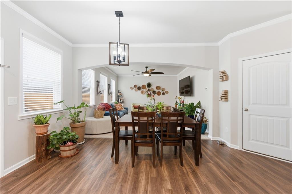 36 Birch River Court Dallas, GA 30132 - Photo 9 of 49 a view of a dining room with furniture window and wooden floor