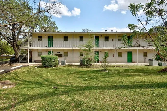 a view of a yard with tree s