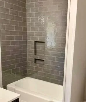 a bathroom with a toilet and a sink