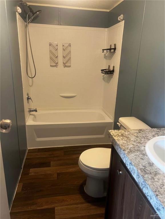 736 Augusta Drive Pharr, TX 78577 - Photo 7 of 8 a bathroom with a granite countertop sink toilet and shower