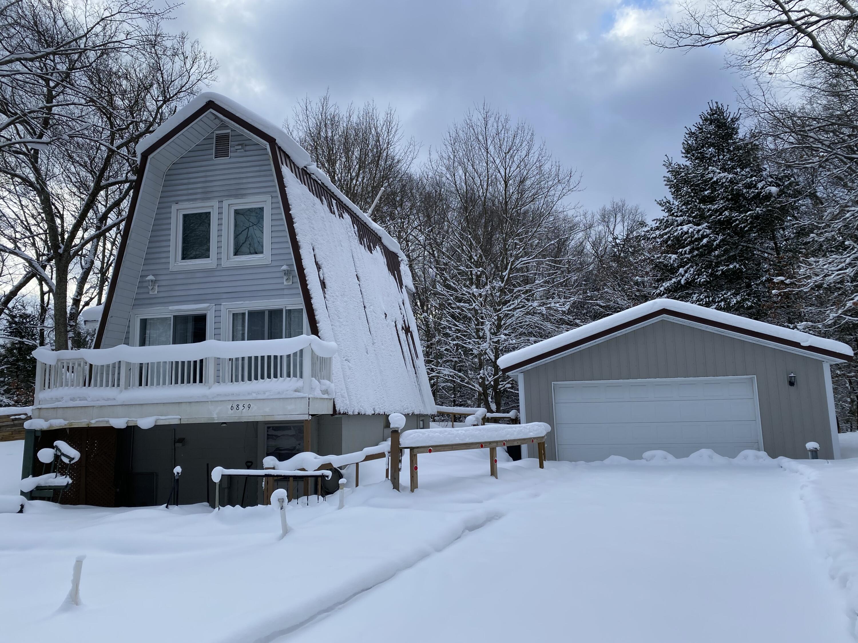 6859 Clover Road Twin Lake, MI 49457 - Photo 1 of 52 6859 Clover Road, Twin Lake, MI 49457