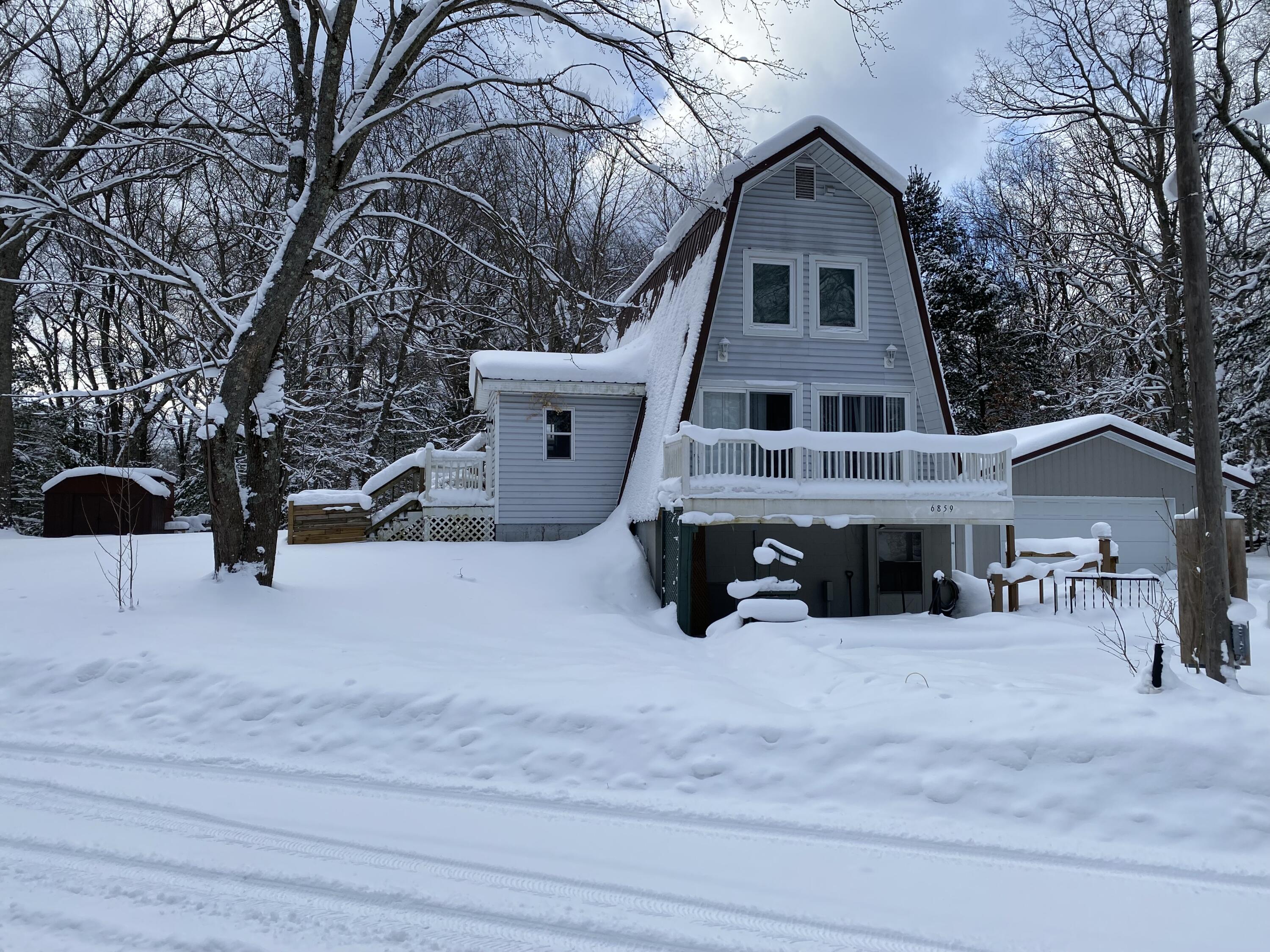 6859 Clover Road Twin Lake, MI 49457 - Photo 2 of 52 6859 Clover Road, Twin Lake, MI 49457