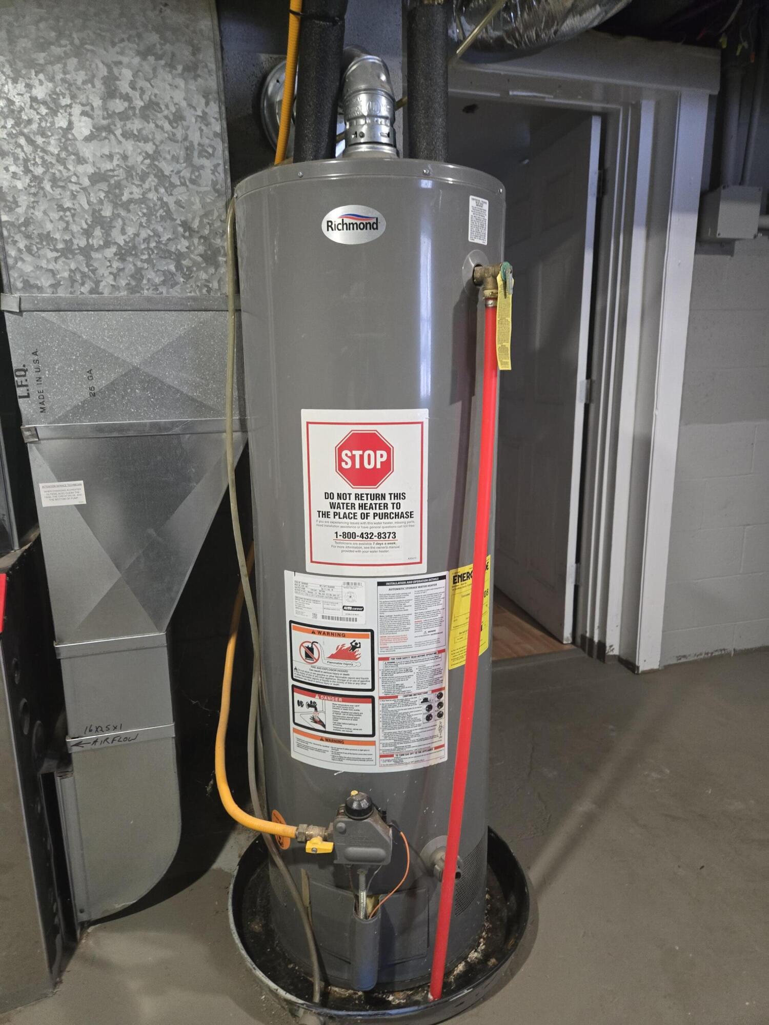 6859 Clover Road Twin Lake, MI 49457 - Photo 34 of 52 Water heater