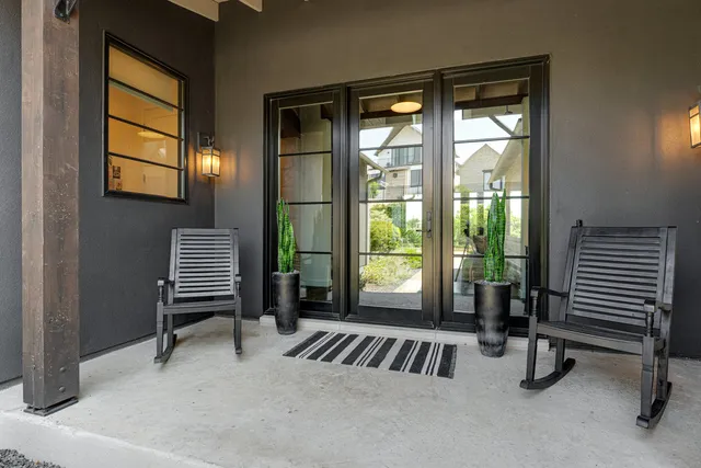 a bedroom with furniture and a window