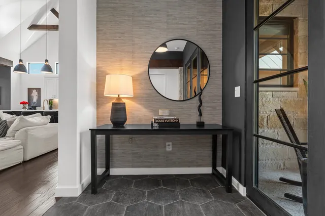 a bathroom with a sink mirror and a vanity