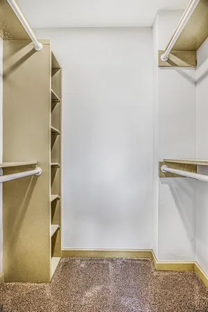 a view of an empty walk in closet