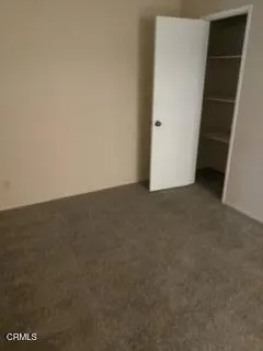 a view of a livingroom from a hallway