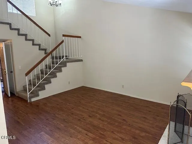 a view of entryway with wooden floor