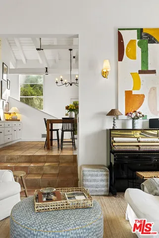 a living room with couch and a table