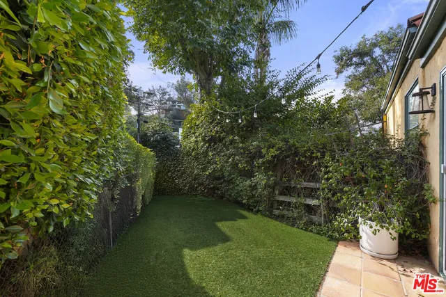 a view of a garden with a bench