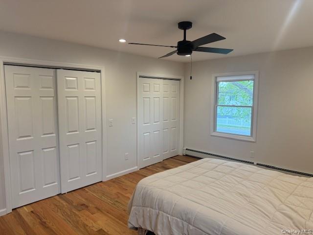 24 Moriches Road Lake Grove, NY 11755 - Photo 17 of 31 a bedroom with a bed and a window