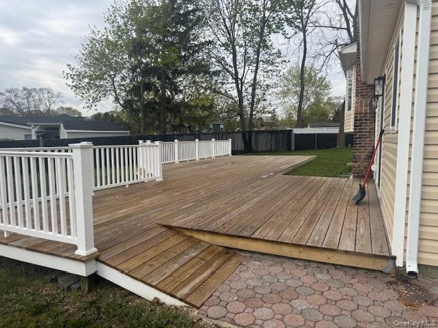 24 Moriches Road Lake Grove, NY 11755 - Photo 21 of 31 a view of backyard with wooden fence