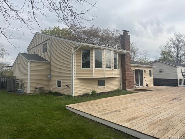 24 Moriches Road Lake Grove, NY 11755 - Photo 24 of 31 a view of a house with a yard