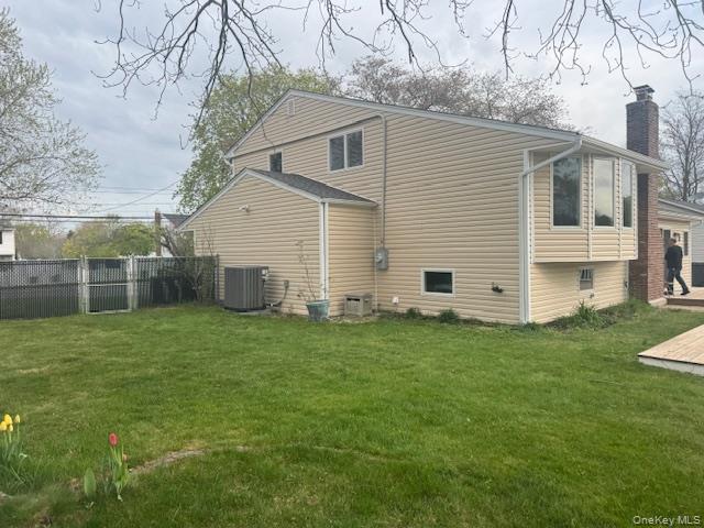 24 Moriches Road Lake Grove, NY 11755 - Photo 25 of 31 a view of a backyard with plants and a garden