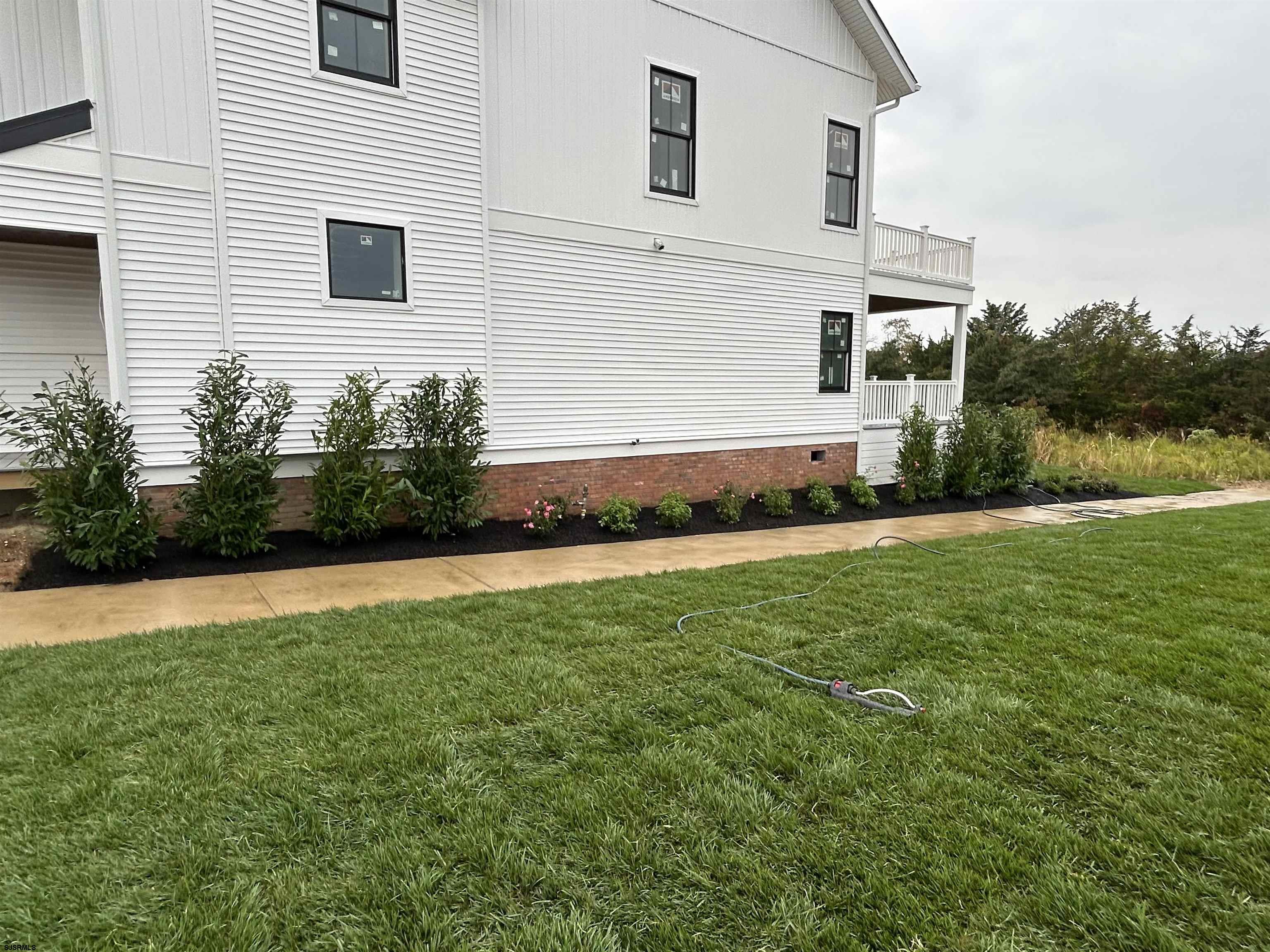 16 Creek Lane Linwood, NJ 08221 - Photo 15 of 26 a view of a house with a yard