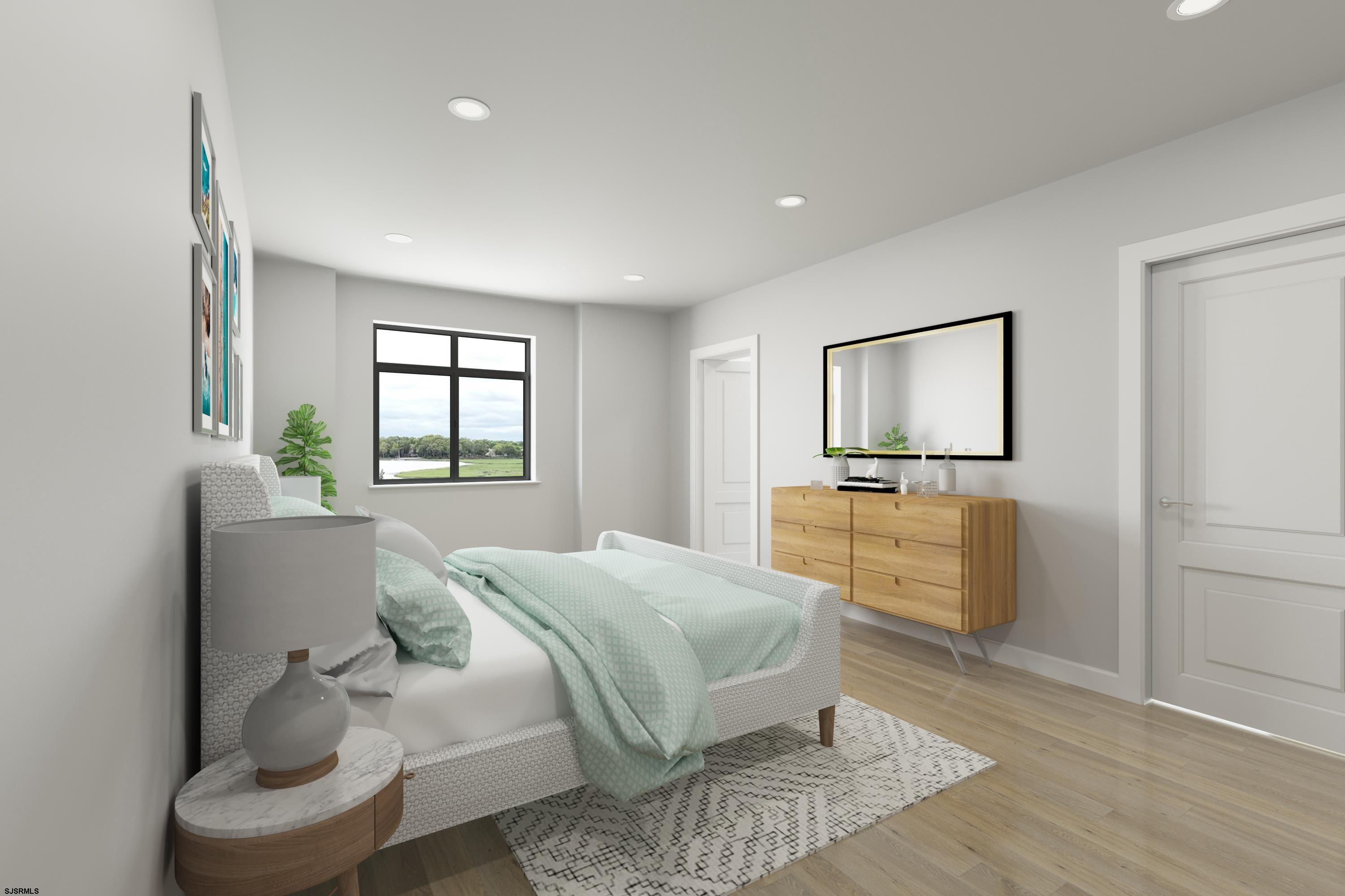 16 Creek Lane Linwood, NJ 08221 - Photo 21 of 26 a bedroom with a large bed and a window