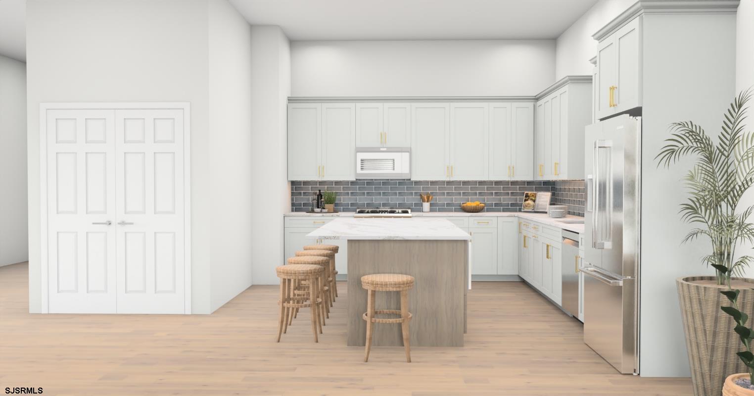 16 Creek Lane Linwood, NJ 08221 - Photo 24 of 26 a kitchen with white cabinets and sink