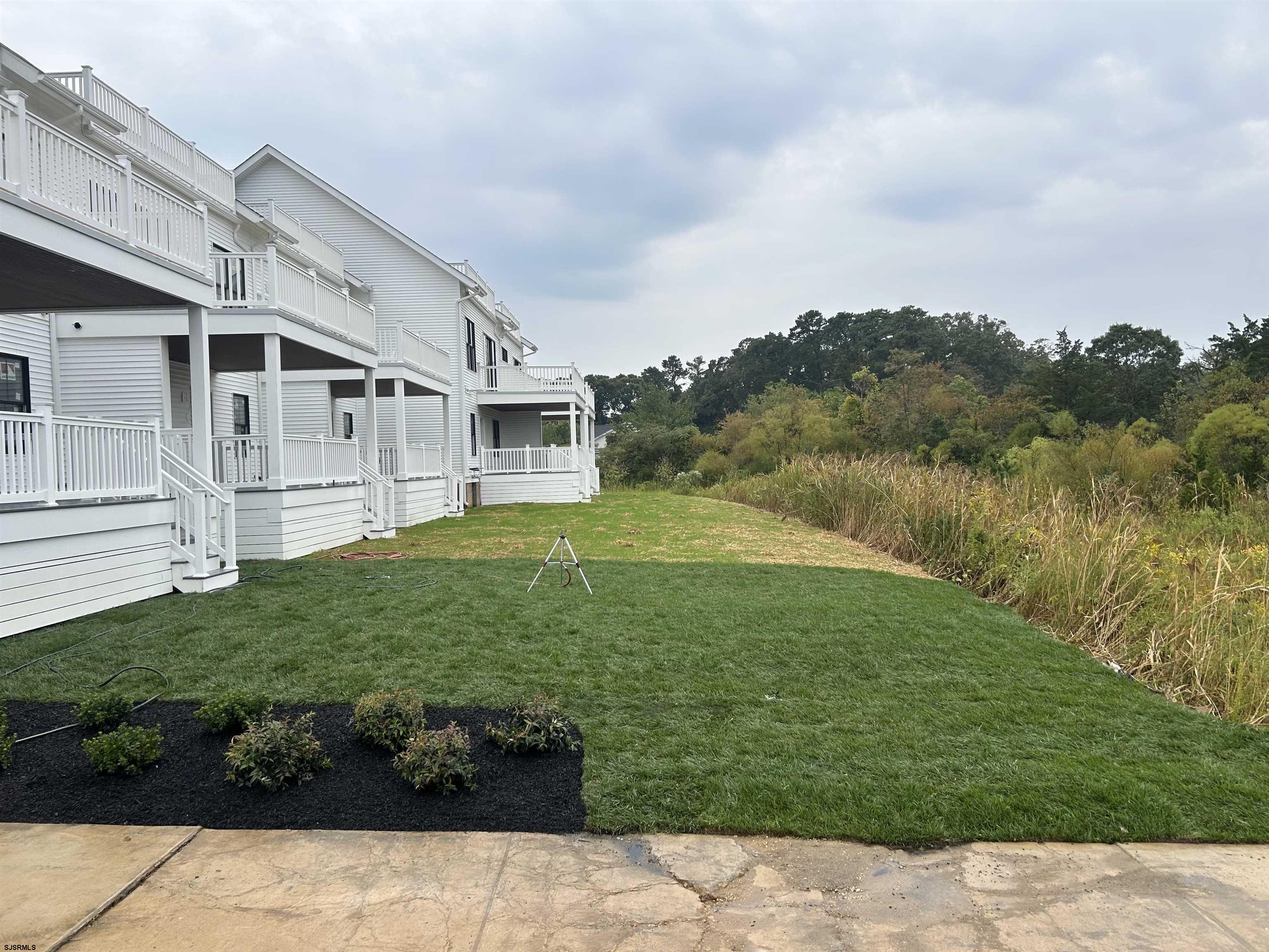 16 Creek Lane Linwood, NJ 08221 - Photo 7 of 26 a view of a back yard