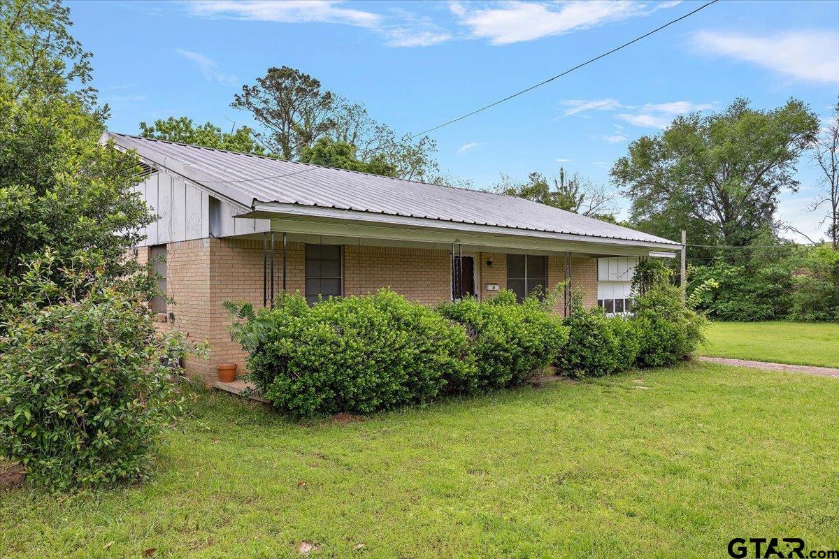 459 Main Street Rusk, TX 75785 - Photo 2 of 12 a view of a house with garden and yard