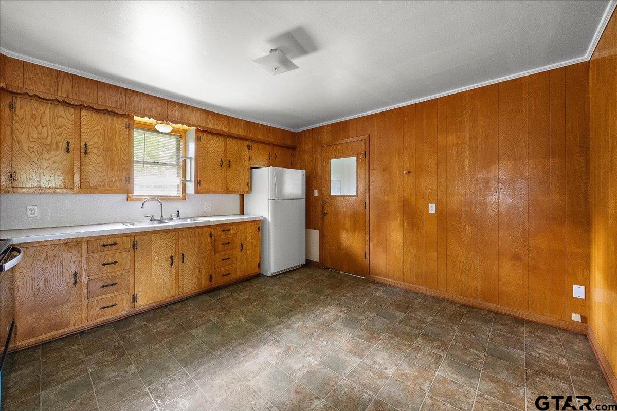 459 Main Street Rusk, TX 75785 - Photo 7 of 12 a spacious bathroom with a granite countertop sink and a window