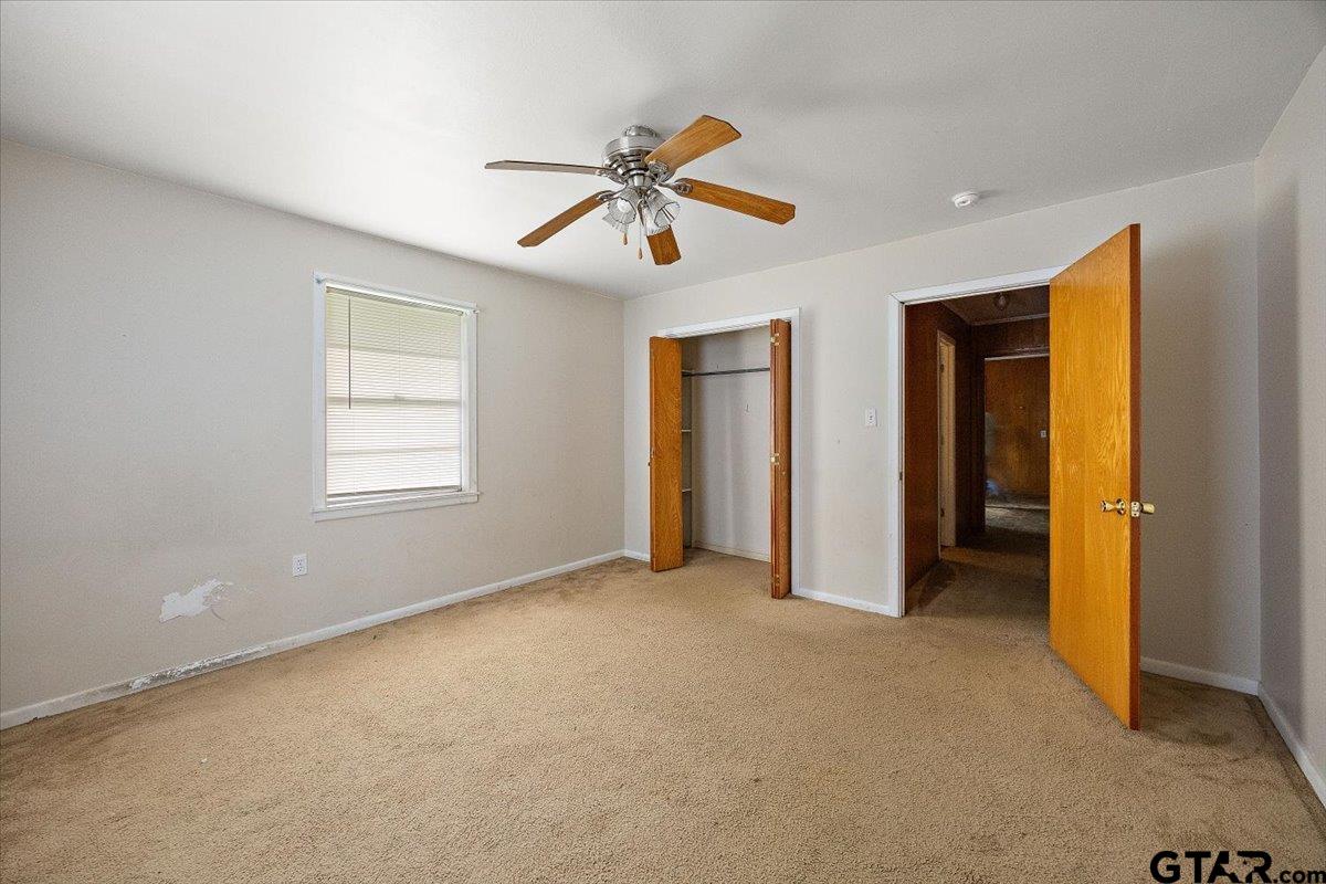 459 Main Street Rusk, TX 75785 - Photo 9 of 12 a view of an empty room with window