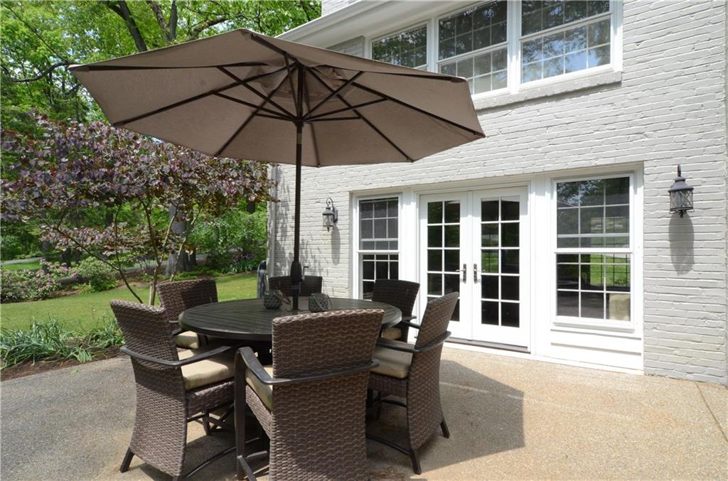 132 Witherow Road Sewickley, PA 15143 - Photo 22 of 25 The inviting patio has a great view of the side yard and level to gently rolling back yard.