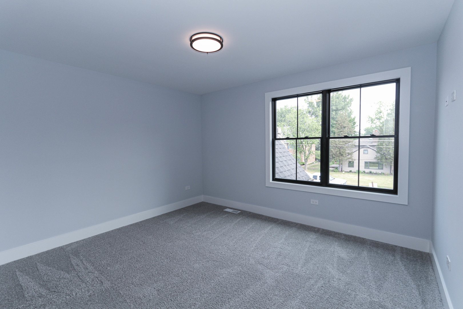 26205 Stewart Ridge Drive Plainfield, IL 60585 - Photo 24 of 27 an empty room with a window