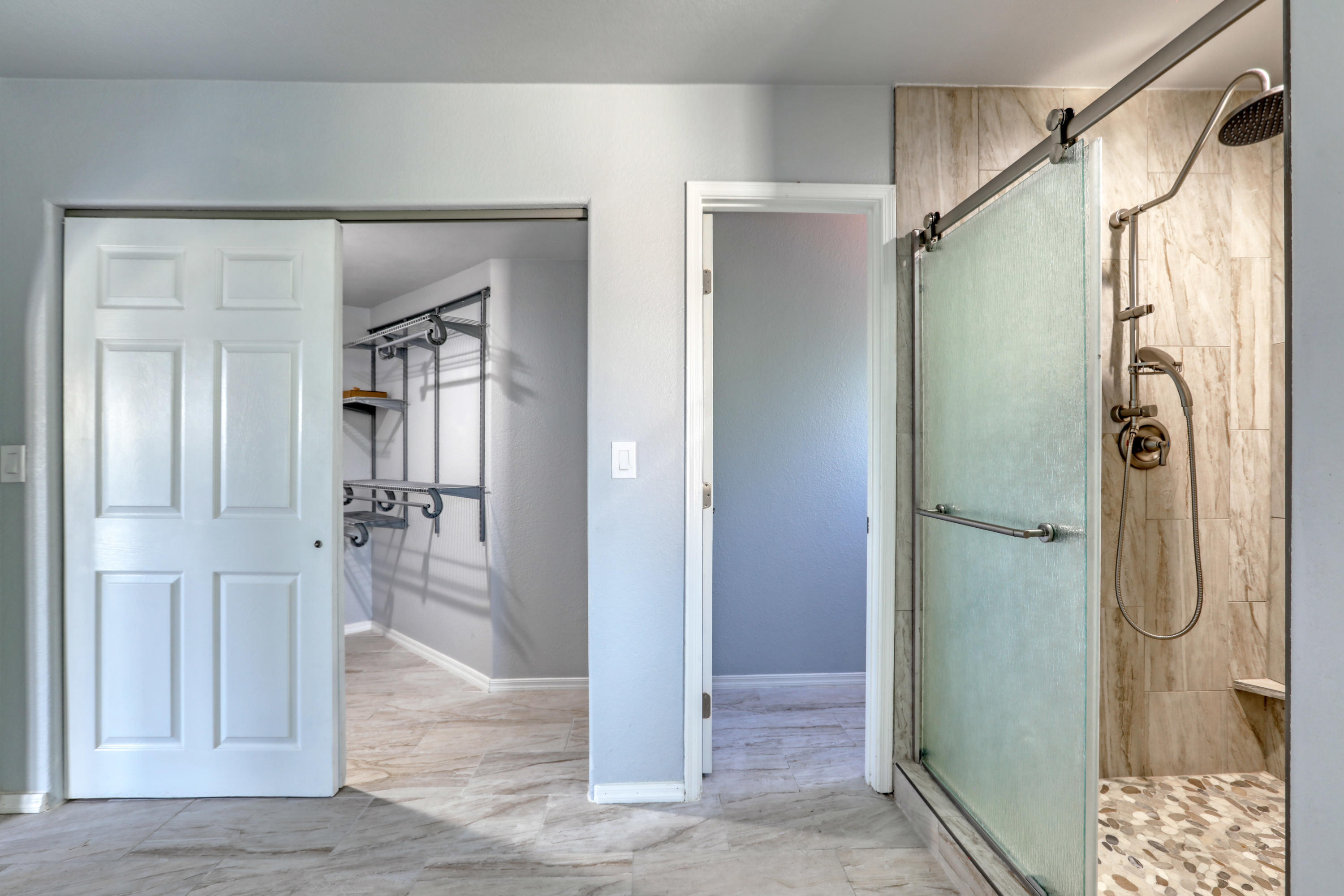 12560 North Wayfarer Way Oro Valley, AZ 85755 - Photo 31 of 43 a bathroom with a glass shower door and a sink