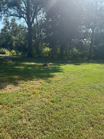a view of outdoor space and yard