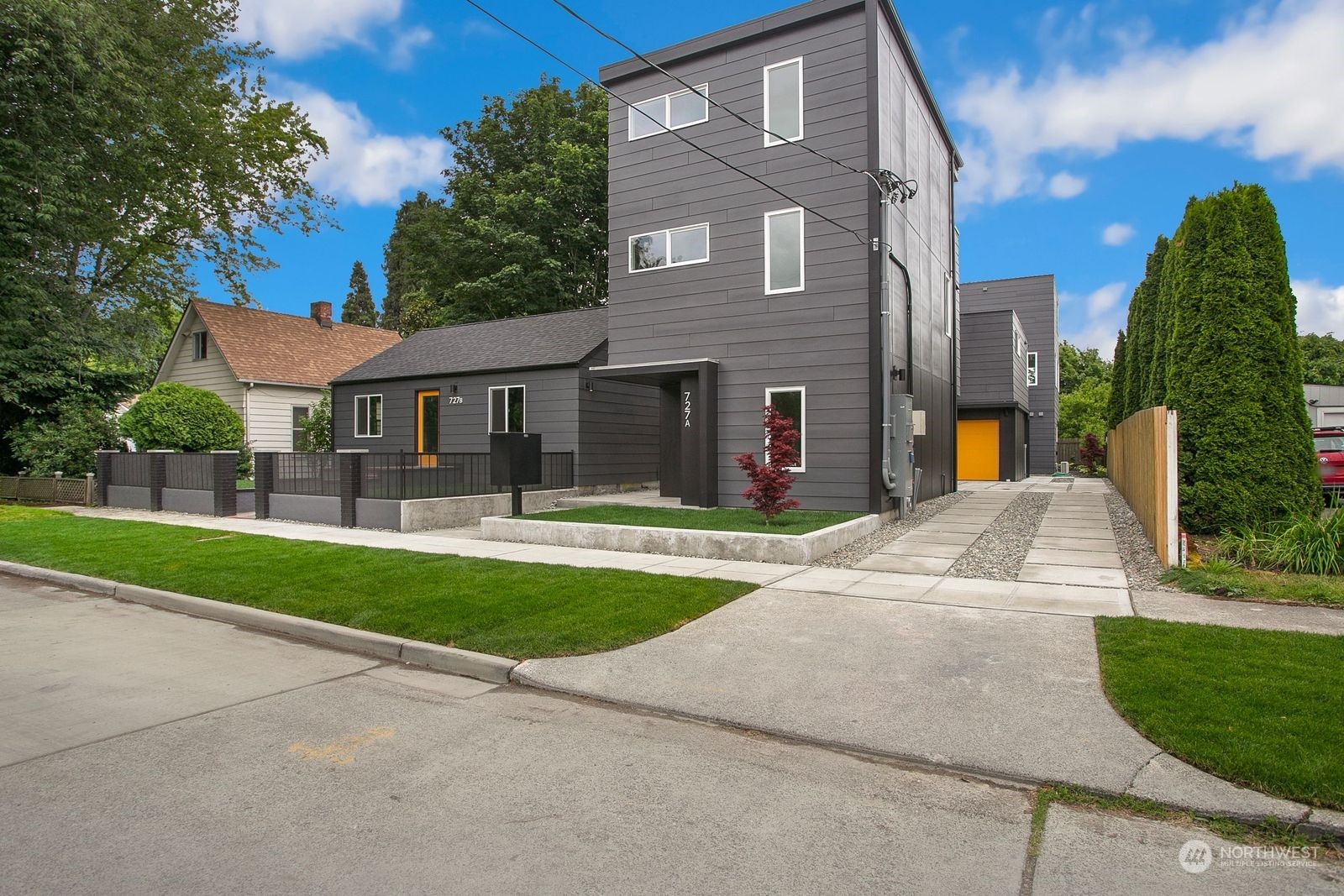 729 South Southern Street Seattle, WA 98108 - Photo 2 of 29 a front view of a house with a yard