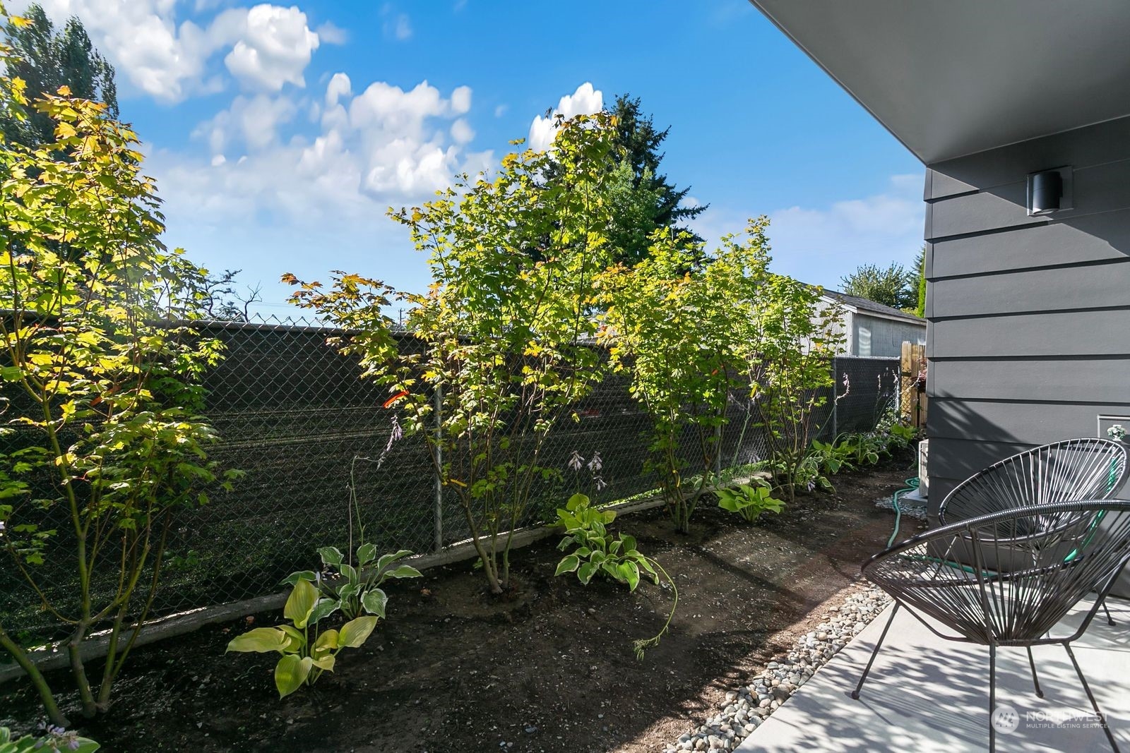 729 South Southern Street Seattle, WA 98108 - Photo 26 of 29 a backyard of a house with lots of green space