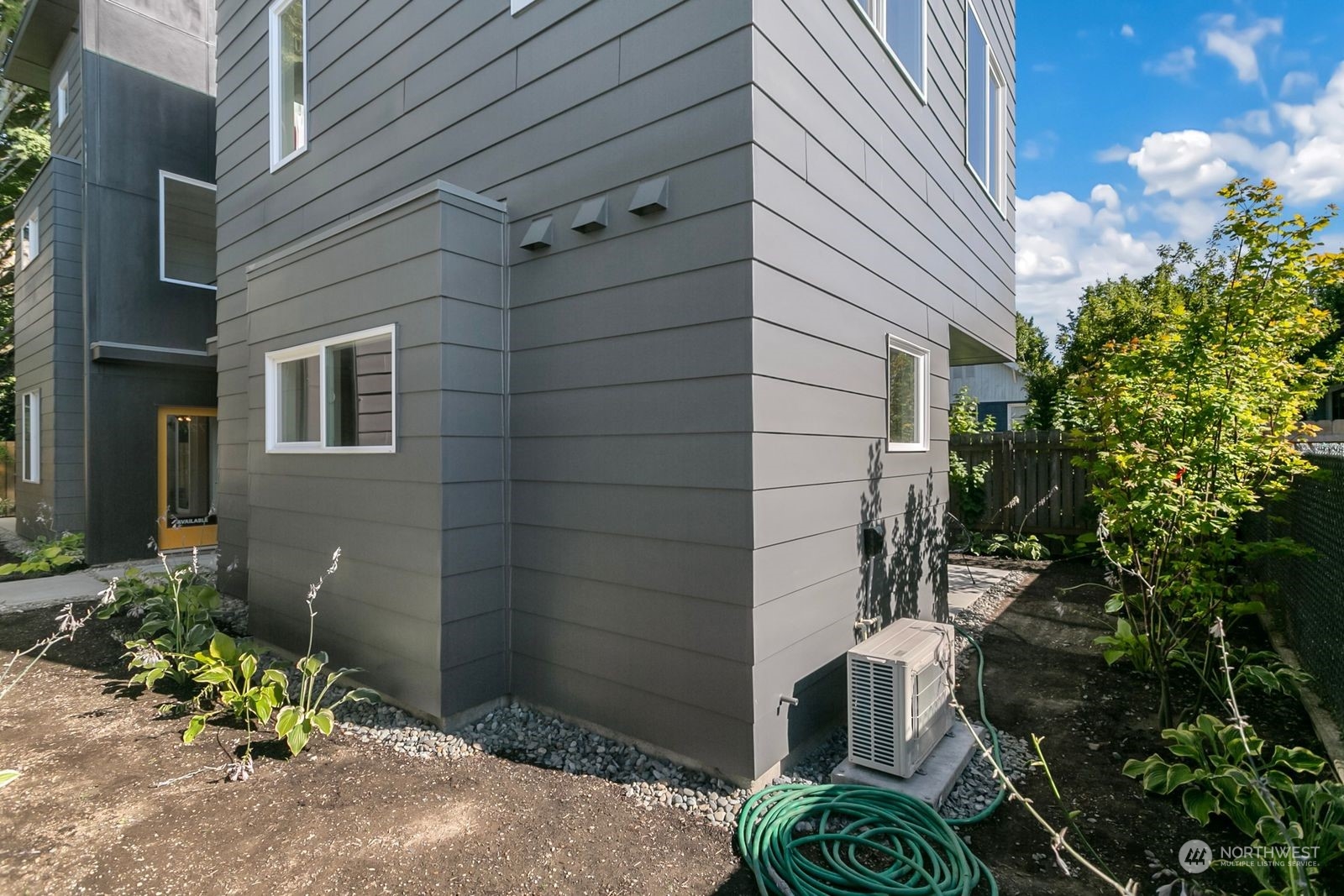729 South Southern Street Seattle, WA 98108 - Photo 27 of 29 a backyard of a house with lots of green space