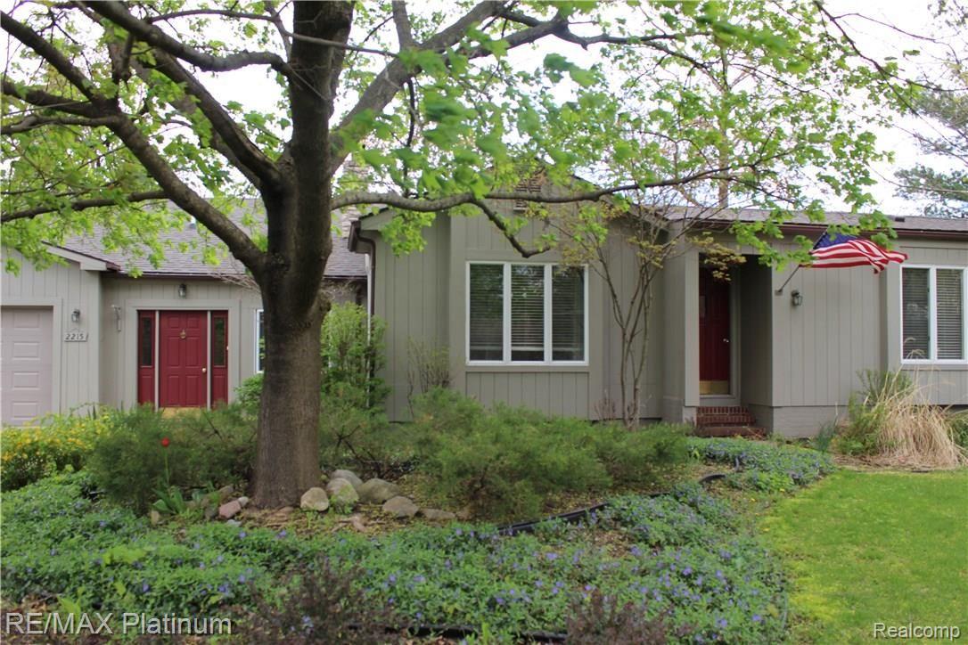 2215 Fenton Road Hartland, MI 48353 - Photo 8 of 15 Mature trees provide beauty, privacy and shade