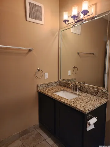 a bathroom with a toilet and a bathtub