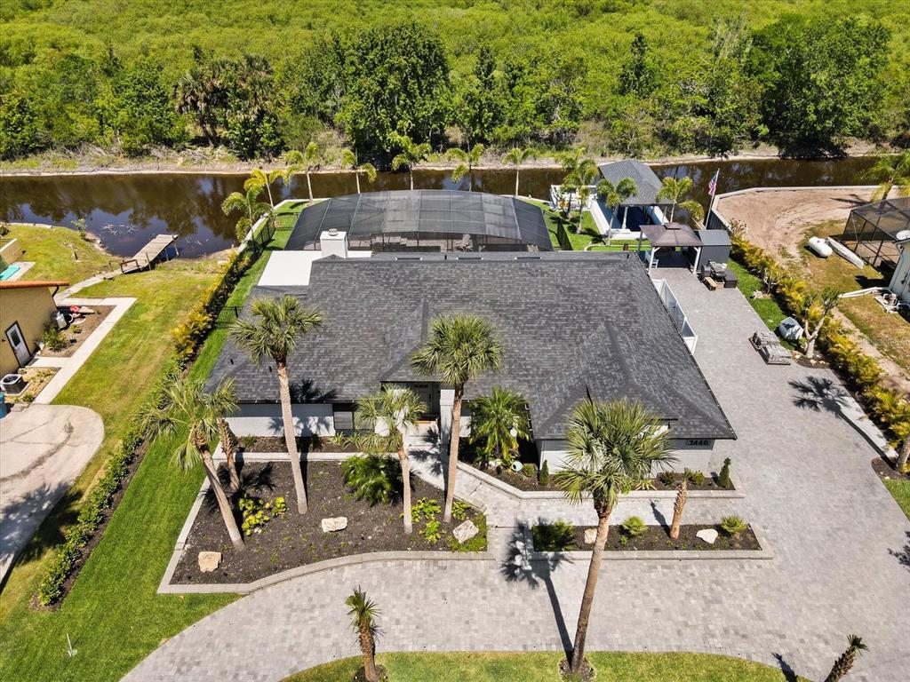 1446 Stone Trail Deltona, FL 32725 - Photo 1 of 1 an aerial view of a house with swimming pool